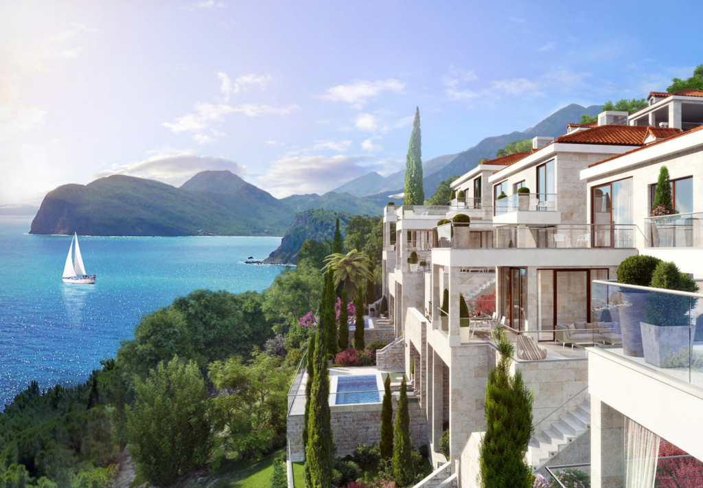 Вид на побережье Черногории с жилыми домами и отелями